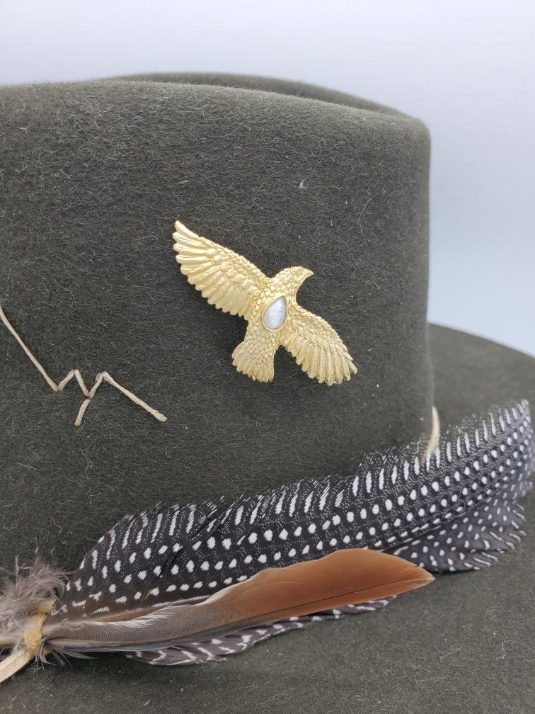 Hawk with Stone, Gold